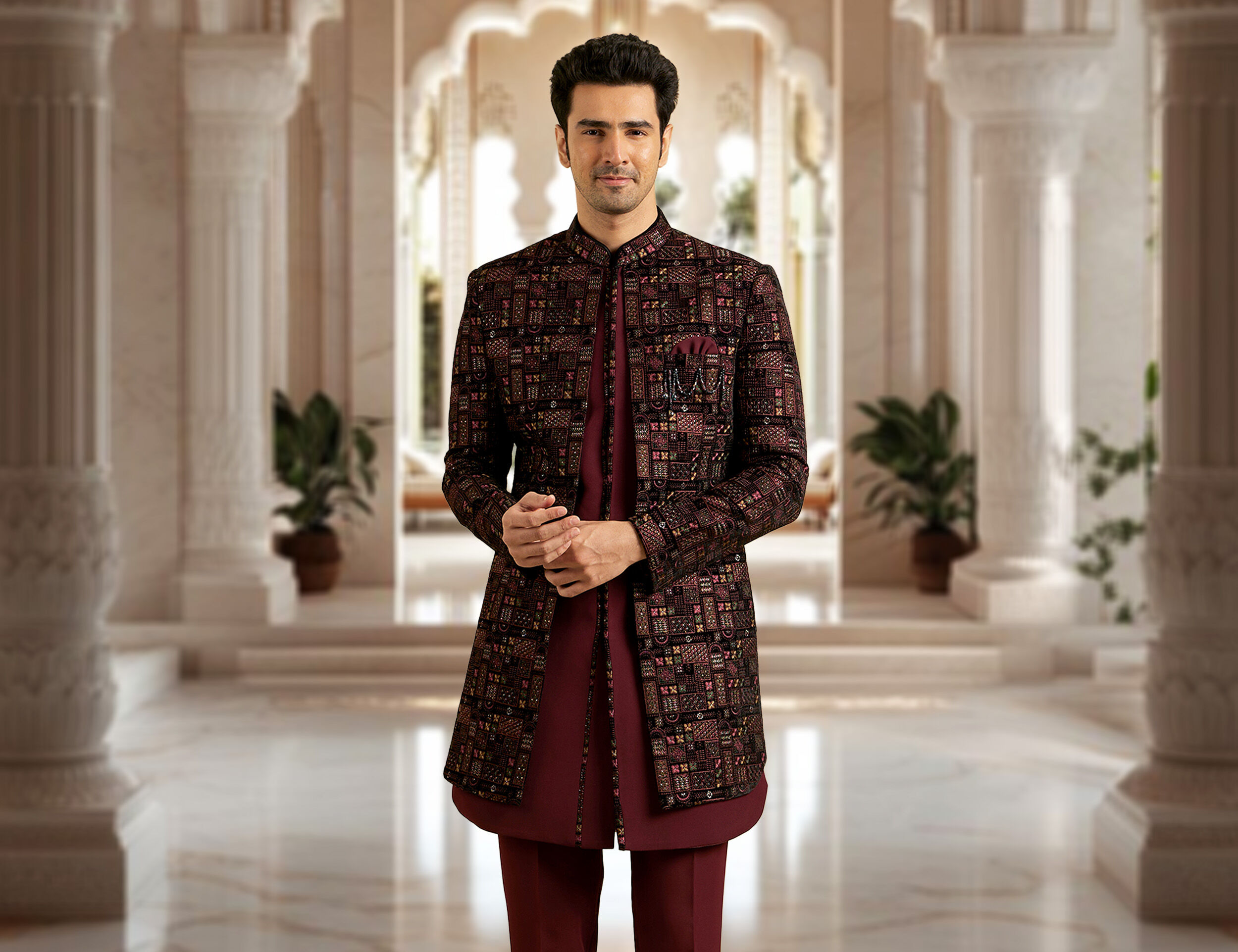 A man wearing brown indo western sherwani